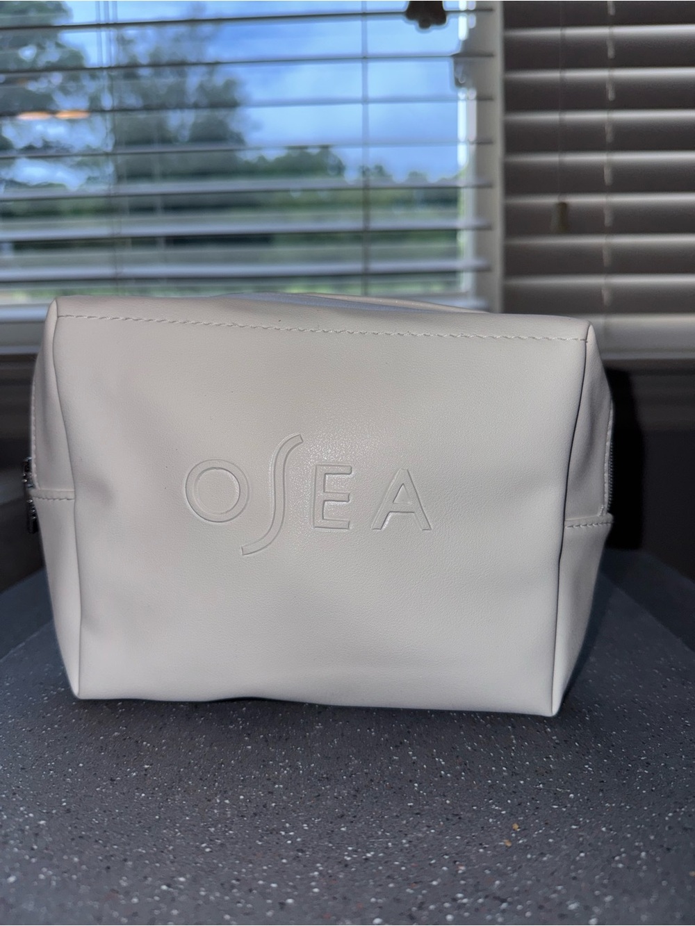 Osea White Leather Toiletry Bag with Embossed Logo